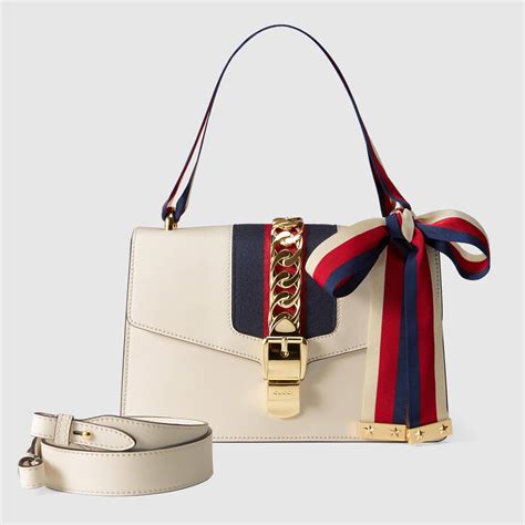 gucci garden buttterfly bag|white Gucci shopping bag.